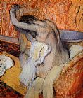 After the Bath, Woman Drying Herself by Edgar Degas